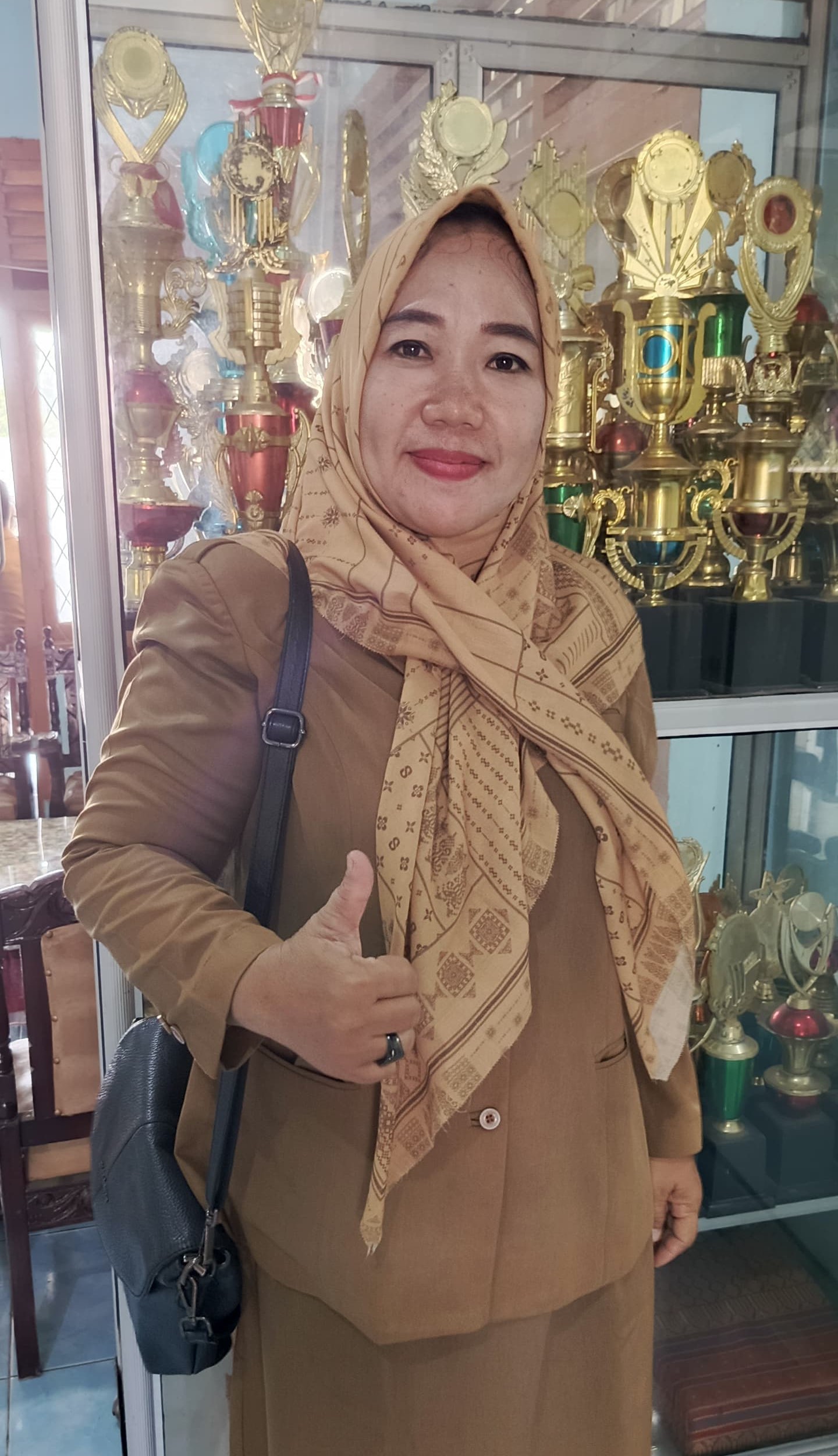 Herlin C. Anggraini, S. Pd.