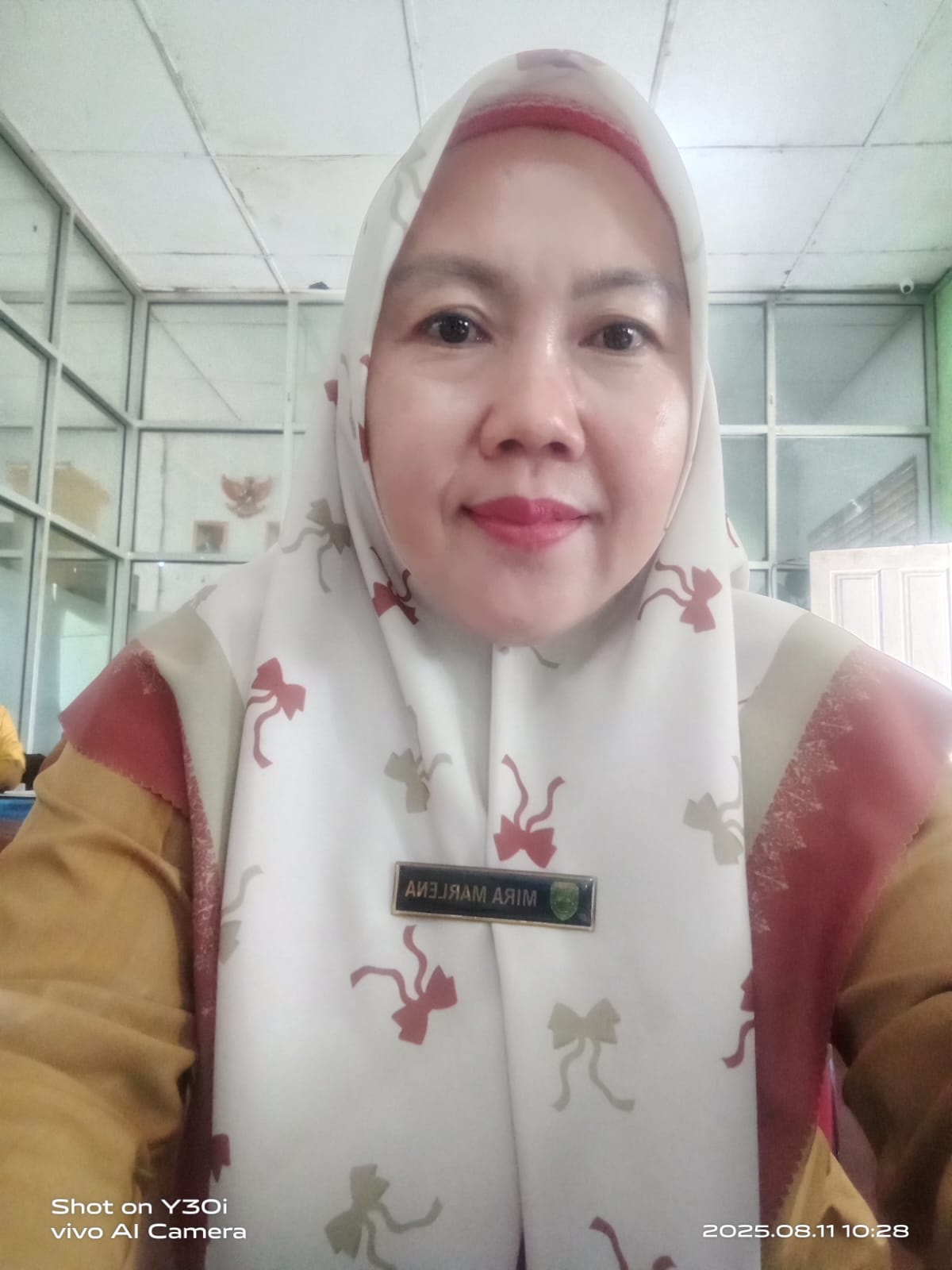 Mira Marlena,S.PdI