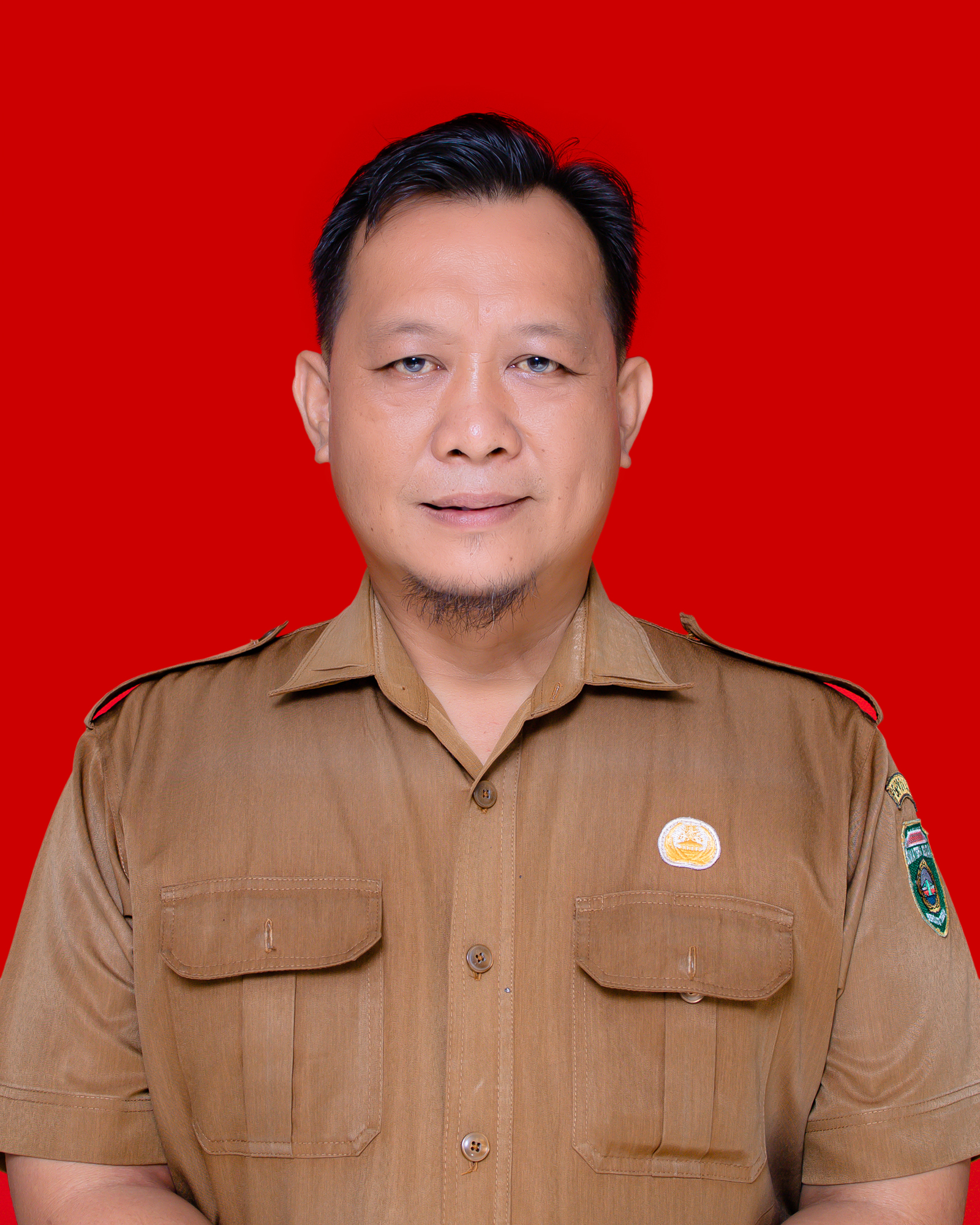 Ari Candera,S.Pd